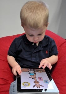 https://commons.wikimedia.org/wiki/File:Child_with_Apple_iPad.jpg